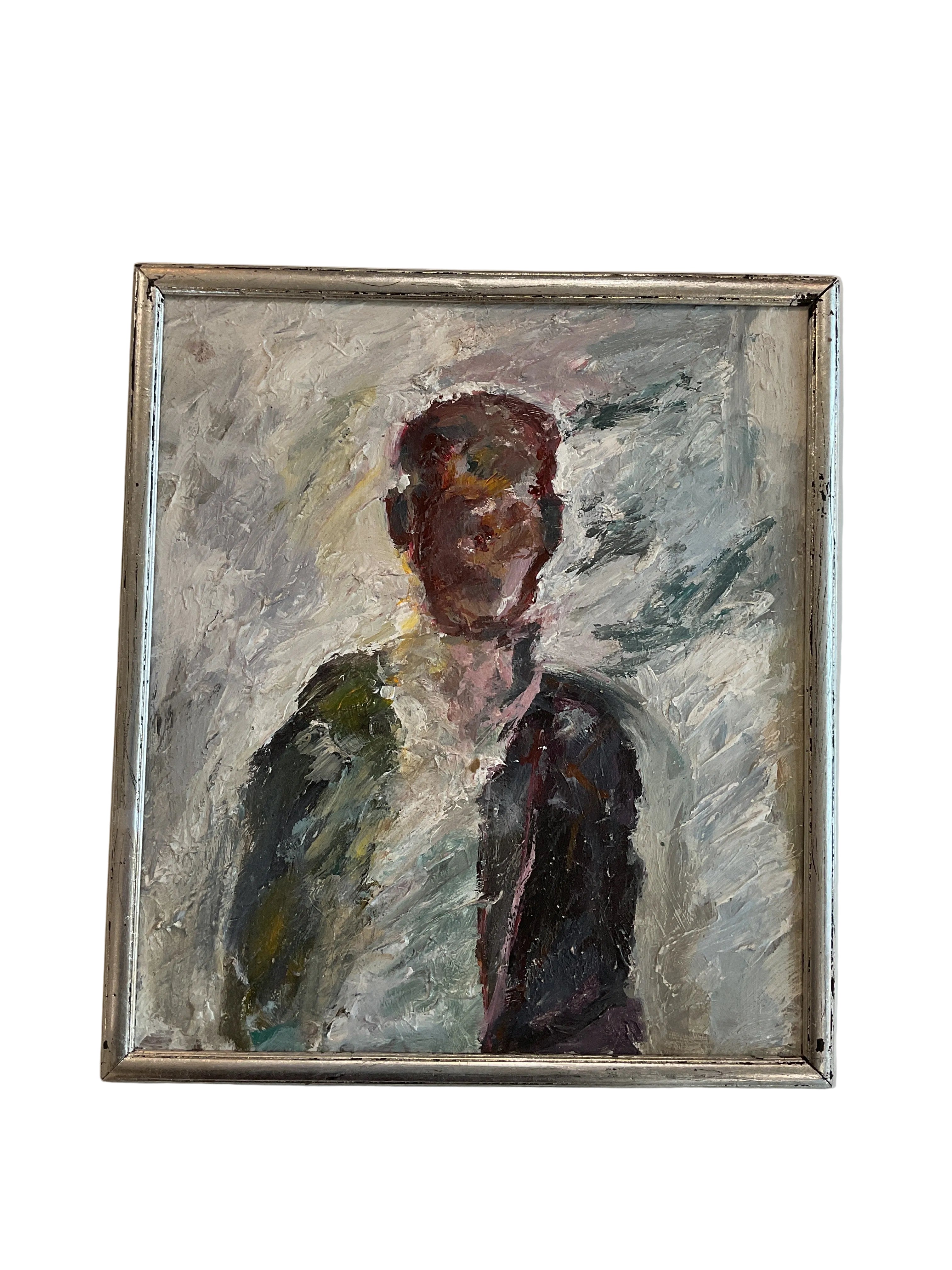 Abstract Face with Silver Leaf Frame